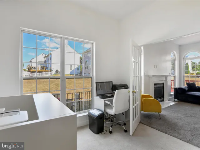 a view of livingroom with furniture and windows