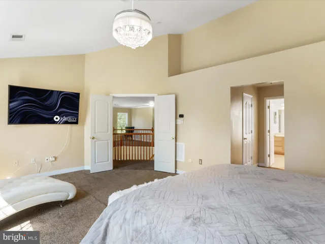 a view of a storage & utility room with washer and dryer