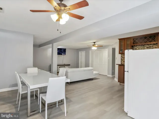 a view of a house with wooden deck
