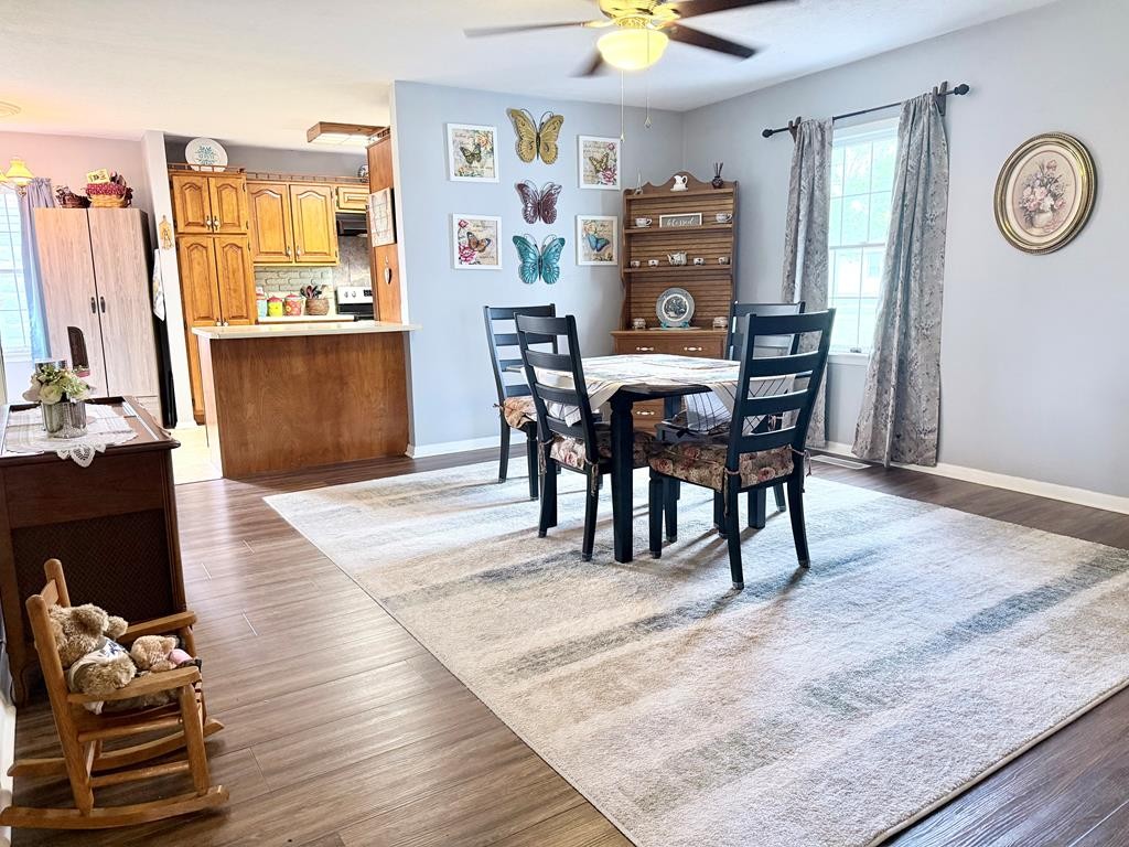 137 Dripping Springs Street Crofton, KY 42217 - Photo 13 of 51 a view of a dining room with furniture and a chandelier