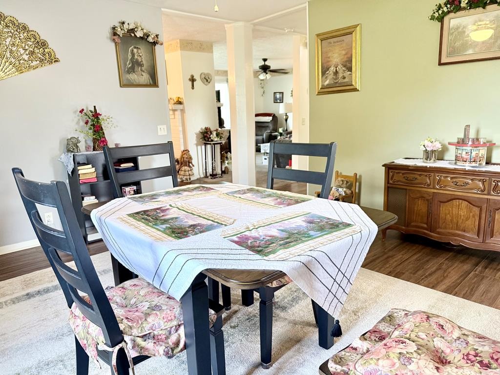 137 Dripping Springs Street Crofton, KY 42217 - Photo 15 of 51 a dining room with a table and chairs