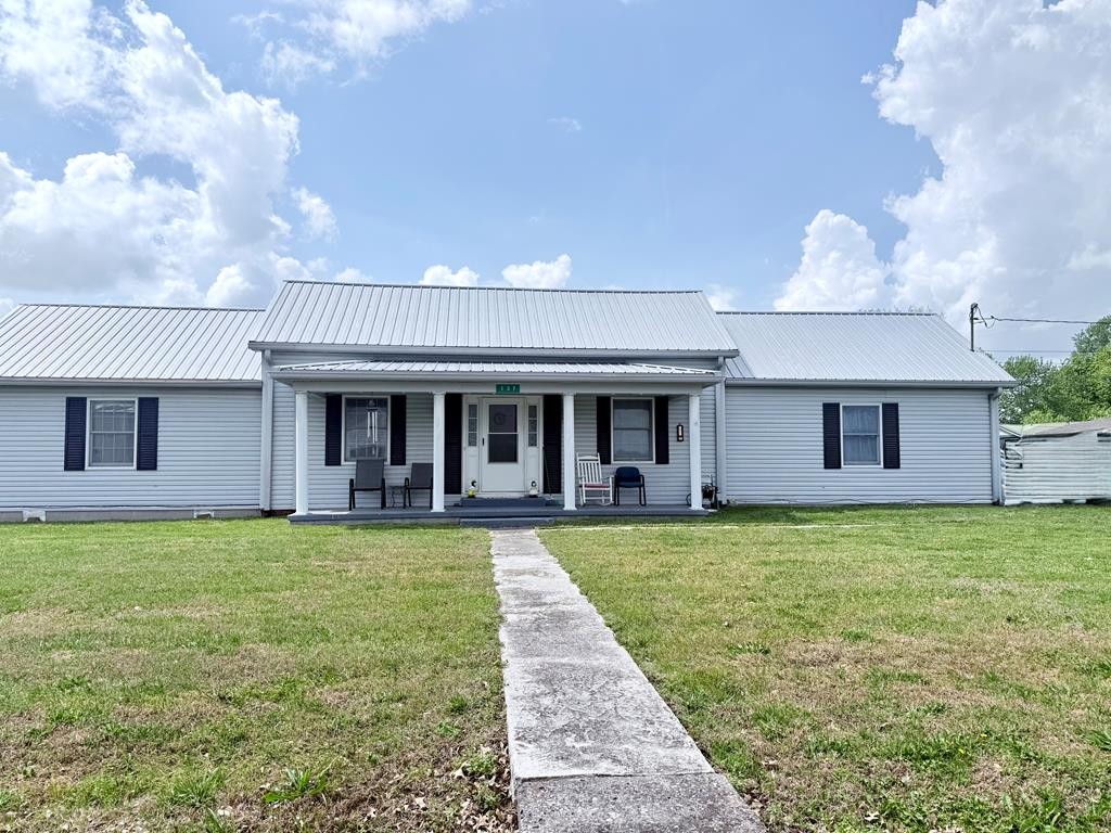 137 Dripping Springs Street Crofton, KY 42217 - Photo 43 of 51 a view of a house with a garden