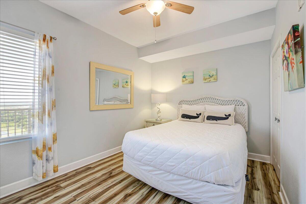 16819 Front Beach Road, Unit 2210 Panama City Beach, FL 32413 - Photo 12 of 30 a bedroom with bed and a window