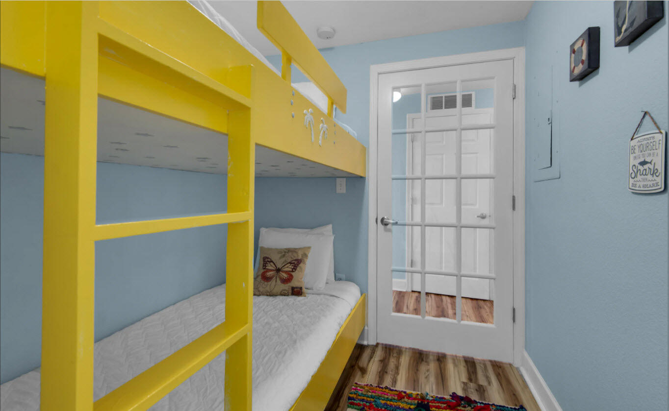 16819 Front Beach Road, Unit 2210 Panama City Beach, FL 32413 - Photo 14 of 30 a view of bedroom and bathroom