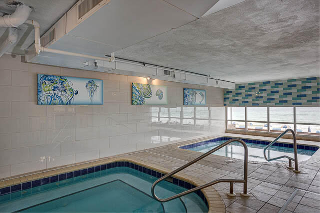 16819 Front Beach Road, Unit 2210 Panama City Beach, FL 32413 - Photo 30 of 30 a room with furniture and window