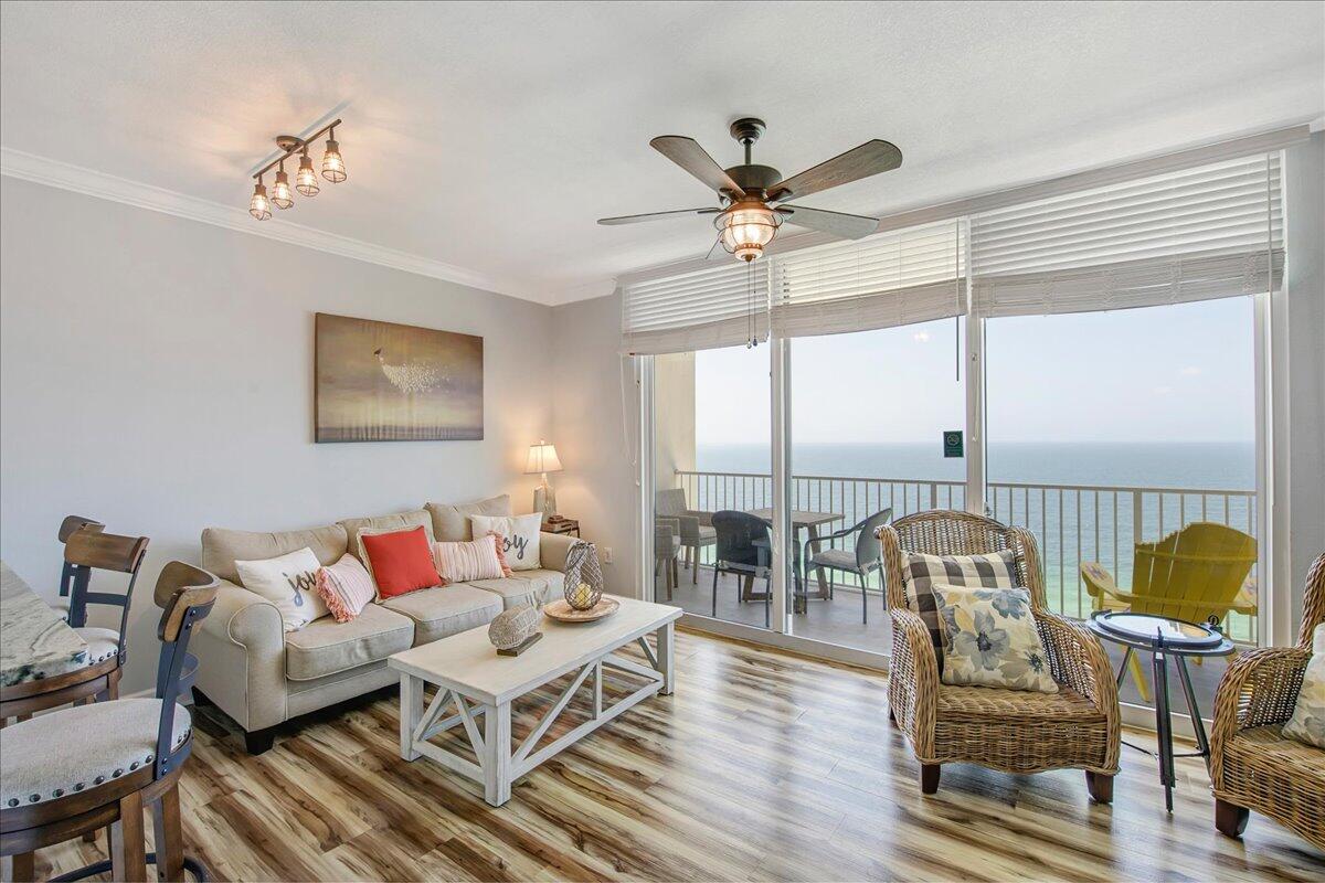 16819 Front Beach Road, Unit 2210 Panama City Beach, FL 32413 - Photo 4 of 30 a living room with furniture and a window