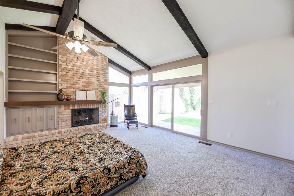 4106 64th Street Lubbock, TX 79413 - Photo 12 of 60 a view of a livingroom with a fireplace