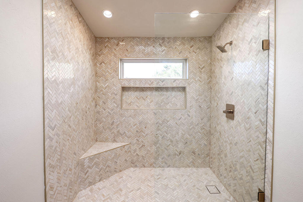 4106 64th Street Lubbock, TX 79413 - Photo 18 of 60 a bathroom with a shower
