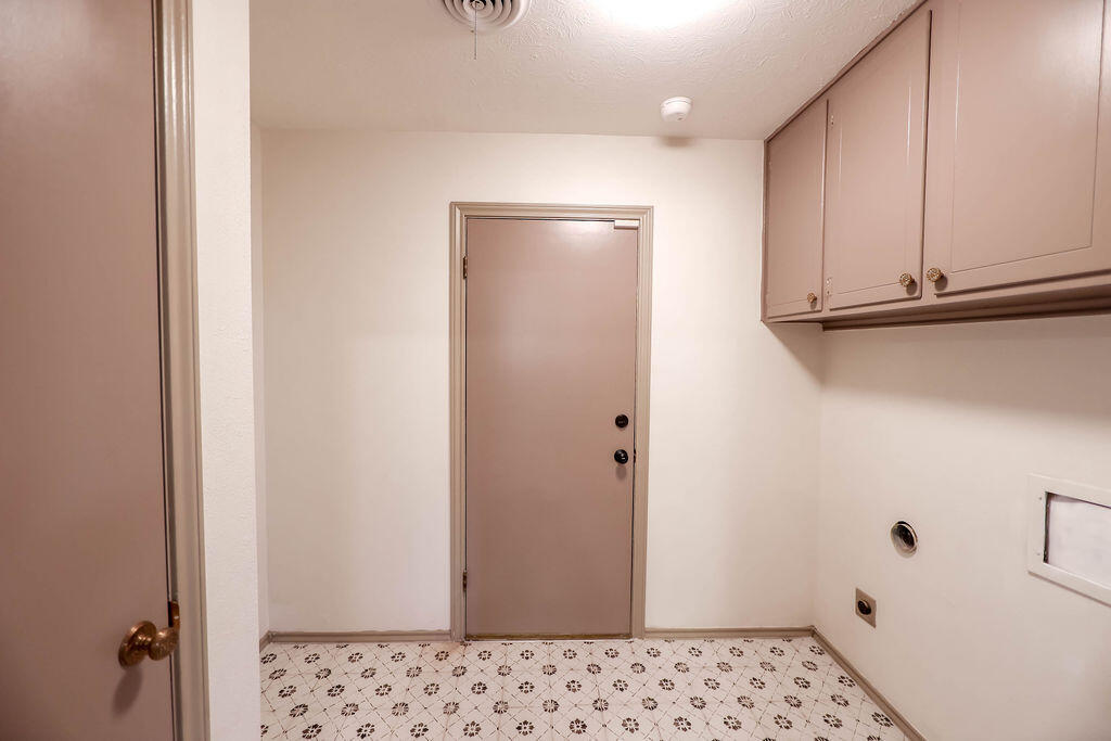 4106 64th Street Lubbock, TX 79413 - Photo 27 of 60 a bathroom with a sink