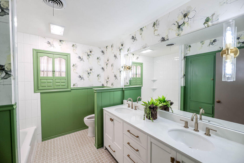 4106 64th Street Lubbock, TX 79413 - Photo 37 of 60 a bathroom with a sink toilet and shower