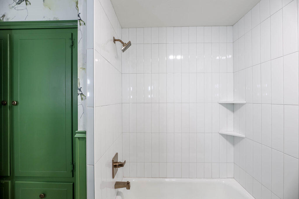 4106 64th Street Lubbock, TX 79413 - Photo 39 of 60 a bathroom with a shower