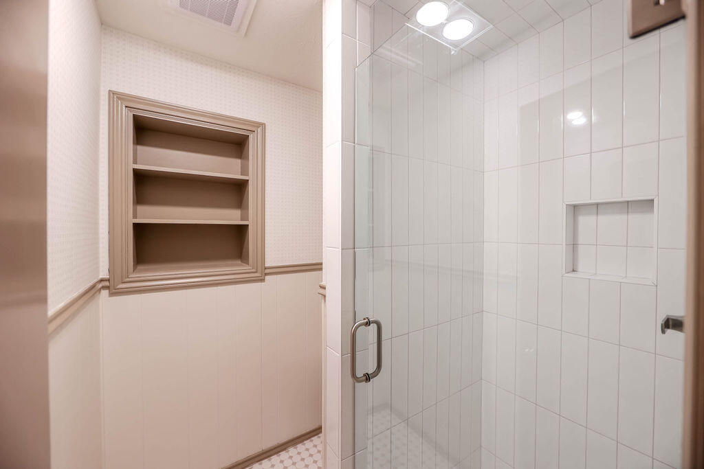 4106 64th Street Lubbock, TX 79413 - Photo 44 of 60 a bathroom with a shower