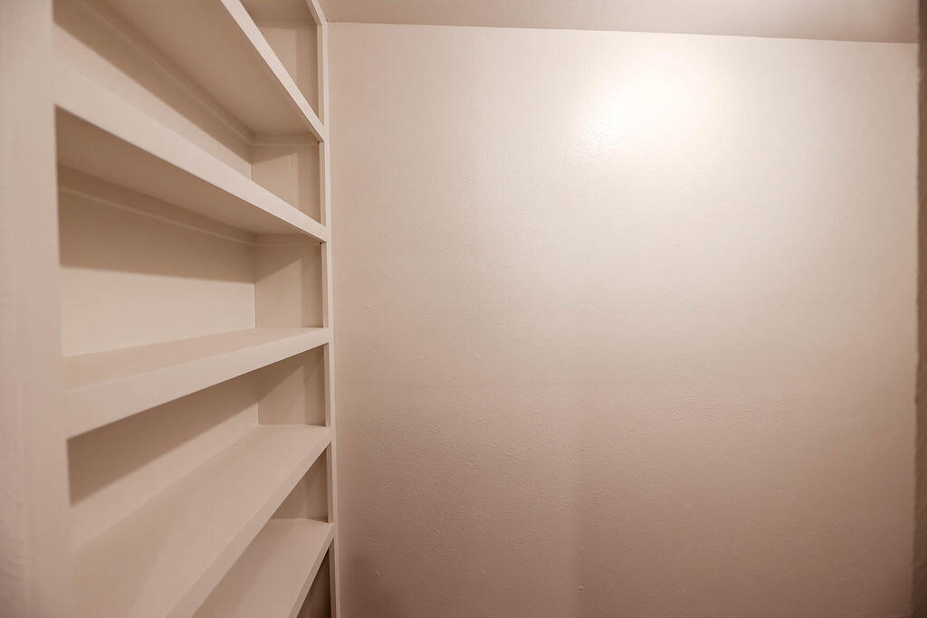 4106 64th Street Lubbock, TX 79413 - Photo 52 of 60 a view of an empty walk in closet