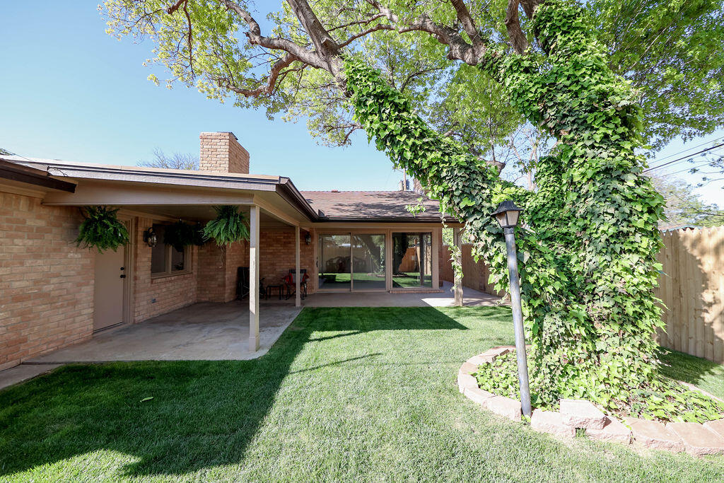 4106 64th Street Lubbock, TX 79413 - Photo 58 of 60 a view of house with a yard