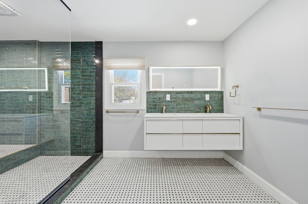 124 Everett Street Natick, MA 01760 - Photo 17 of 26 a bathroom with a shower