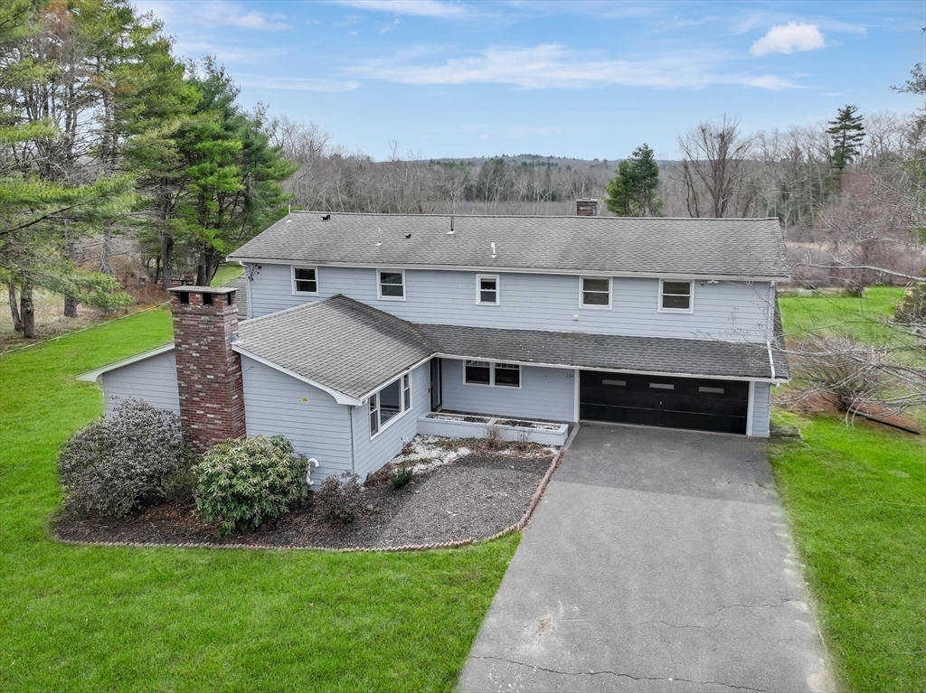 124 Everett Street Natick, MA 01760 - Photo 26 of 26 an aerial view of a house with a yard