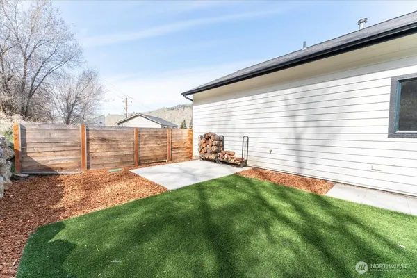 a view of a backyard with a garden