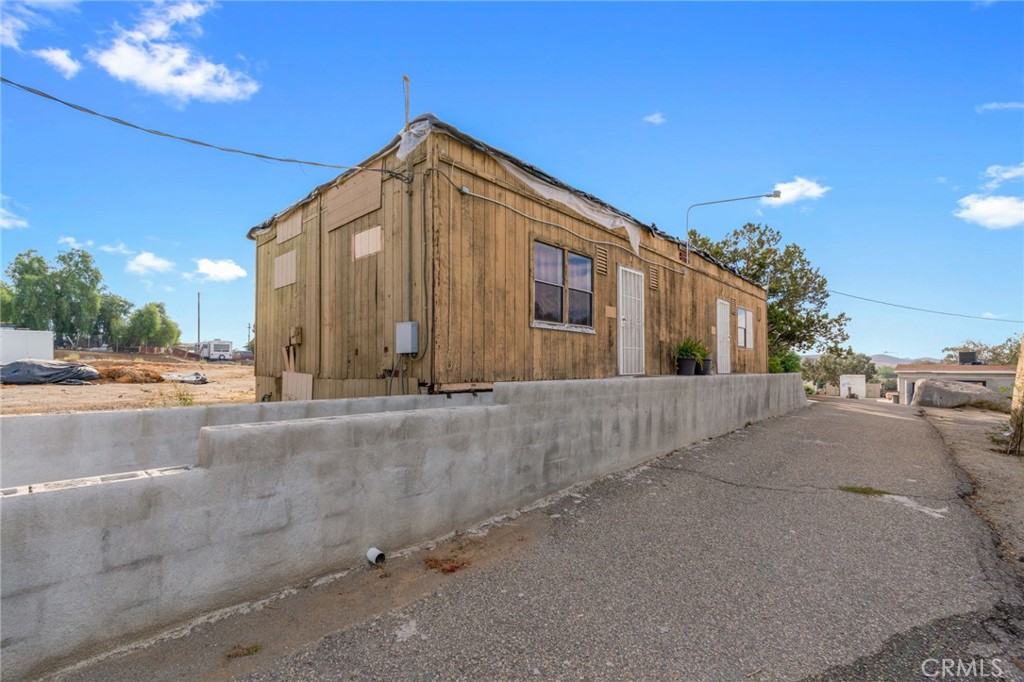 21871 Richard Street Perris, CA 92570 - Photo 21 of 75 a view of a house with a street
