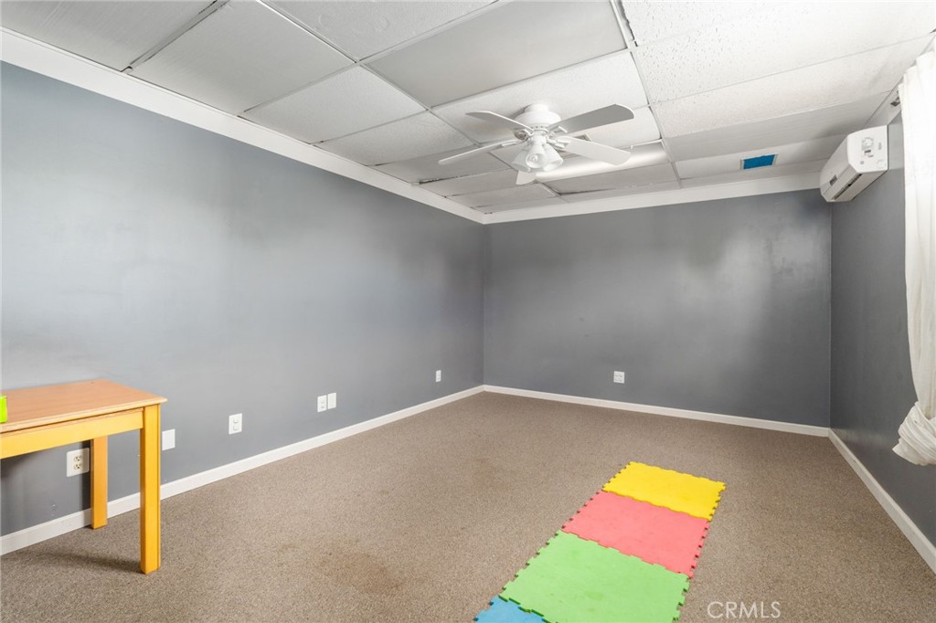 21871 Richard Street Perris, CA 92570 - Photo 35 of 75 a view of an empty room with a window