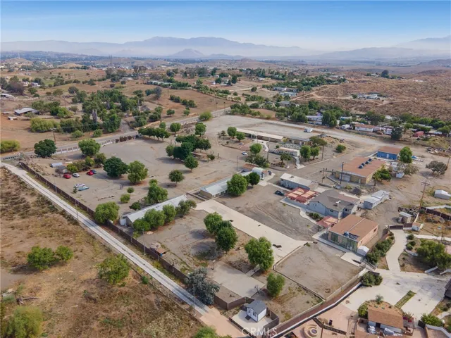 an aerial view of residential house and outdoor space