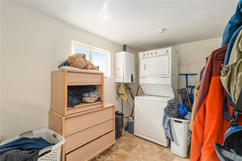 21871 Richard Street Perris, CA 92570 - Photo 42 of 75 a utility room with dryer and washer