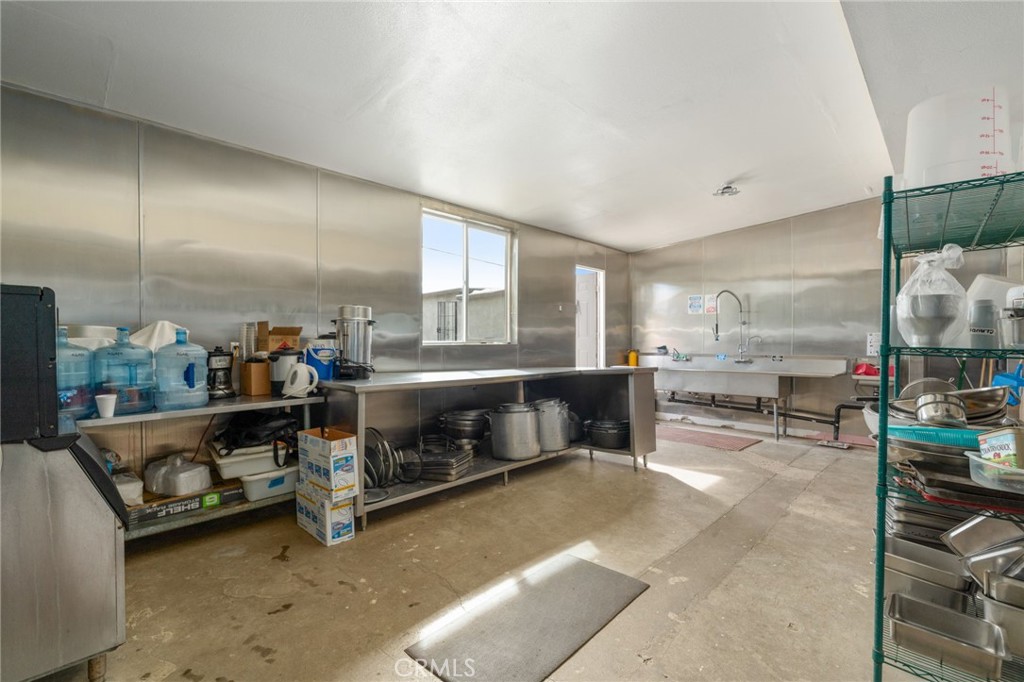 21871 Richard Street Perris, CA 92570 - Photo 47 of 75 a living room with furniture and a large window