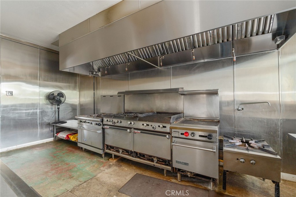 21871 Richard Street Perris, CA 92570 - Photo 50 of 75 a kitchen with refrigerator and stove