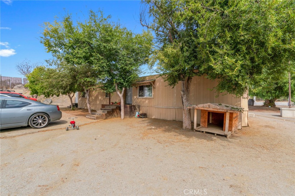 21871 Richard Street Perris, CA 92570 - Photo 67 of 75 a view of a car park in front of house