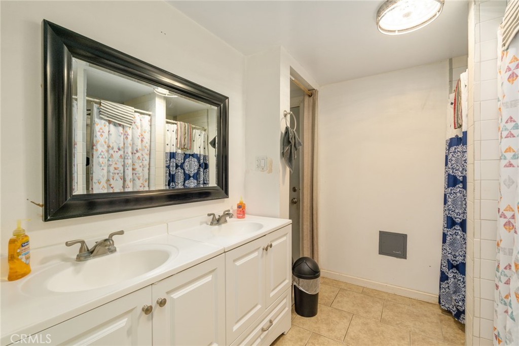 21871 Richard Street Perris, CA 92570 - Photo 73 of 75 a bathroom with a sink and a mirror