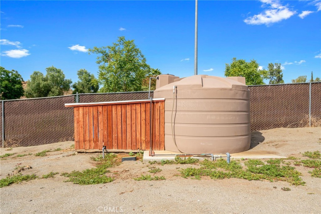 21871 Richard Street Perris, CA 92570 - Photo 74 of 75 a view of a house with a backyard