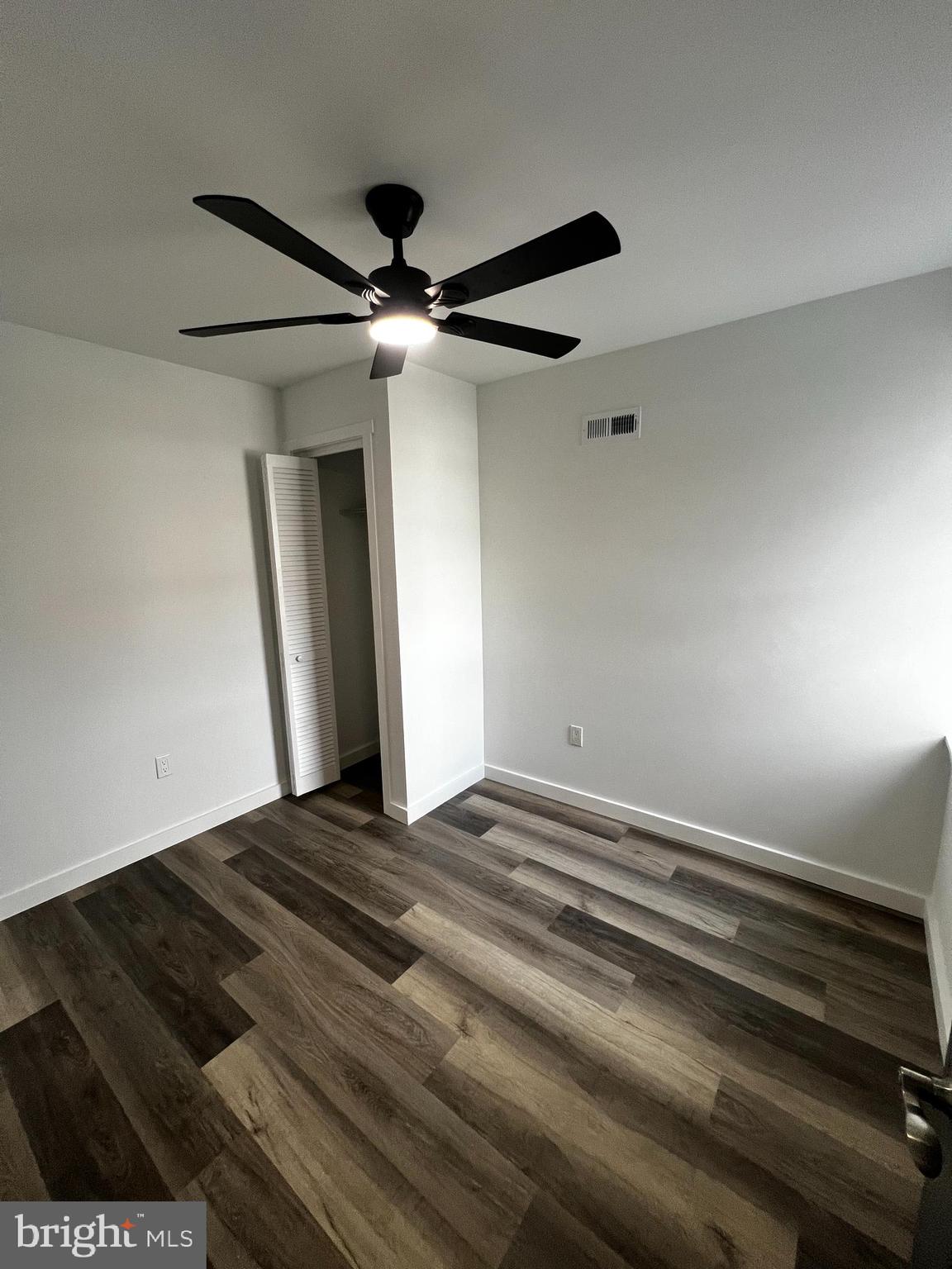 1551 Church Street, Unit 2 Philadelphia, PA 19124 - Photo 11 of 14 a bedroom with a bed and a ceiling fan