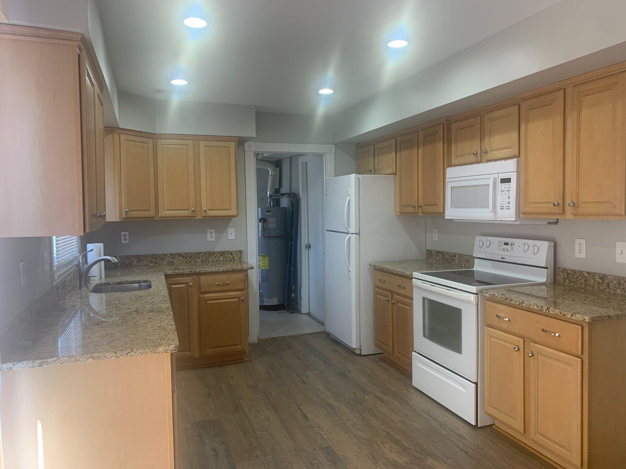 13217 Poplar Tree Road Fairfax, VA 22033 - Photo 6 of 15 Lots of cabinets granite counter tops