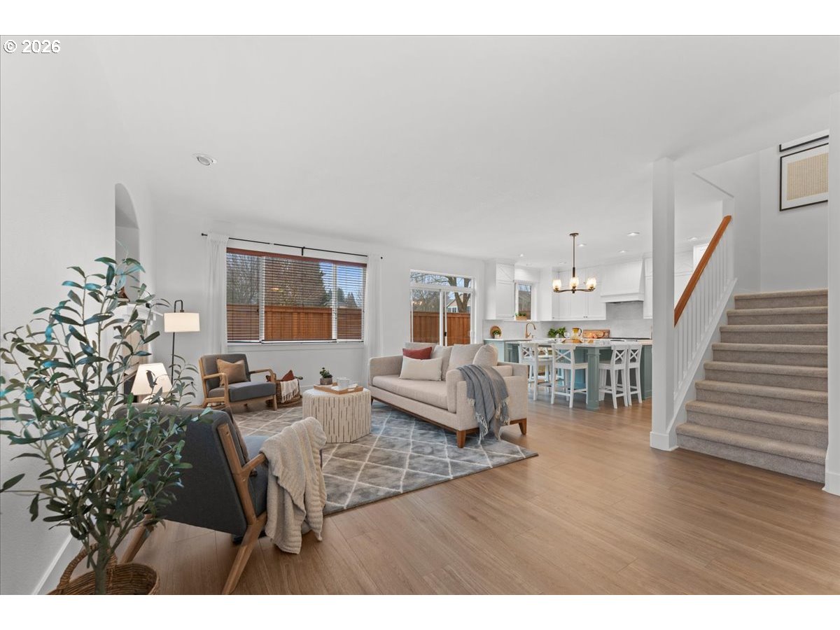 11595 Southwest Butte Lane Beaverton, OR 97008 - Photo 11 of 48 a living room with furniture and a table