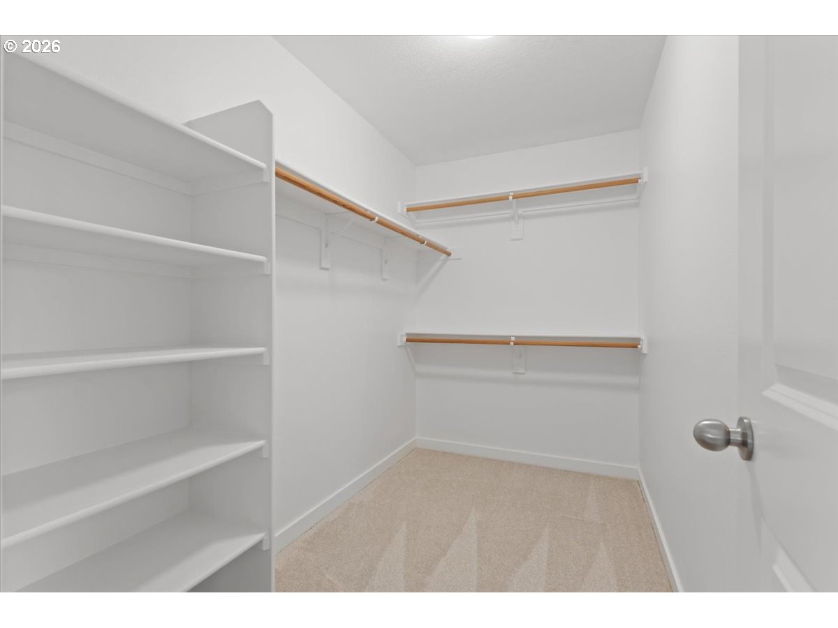 11595 Southwest Butte Lane Beaverton, OR 97008 - Photo 27 of 48 a view of an empty walk in closet
