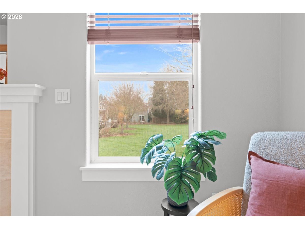 11595 Southwest Butte Lane Beaverton, OR 97008 - Photo 29 of 48 a potted plant sitting on a window sill and a sink