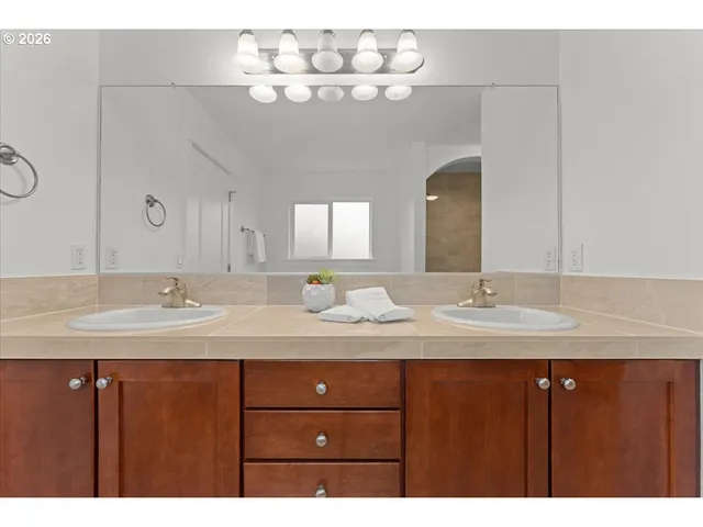 a bathroom with a bathtub and a sink