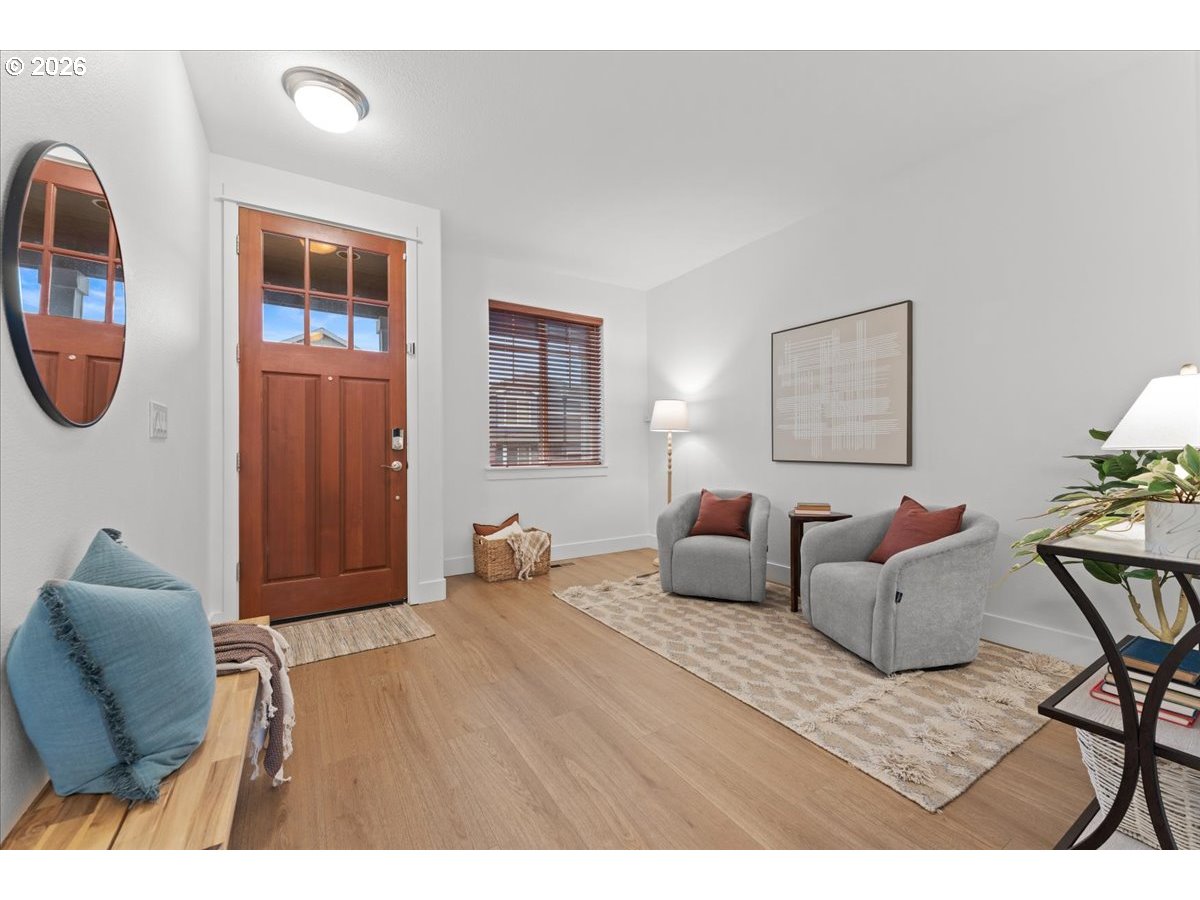 11595 Southwest Butte Lane Beaverton, OR 97008 - Photo 6 of 48 a bedroom with furniture and a potted plant