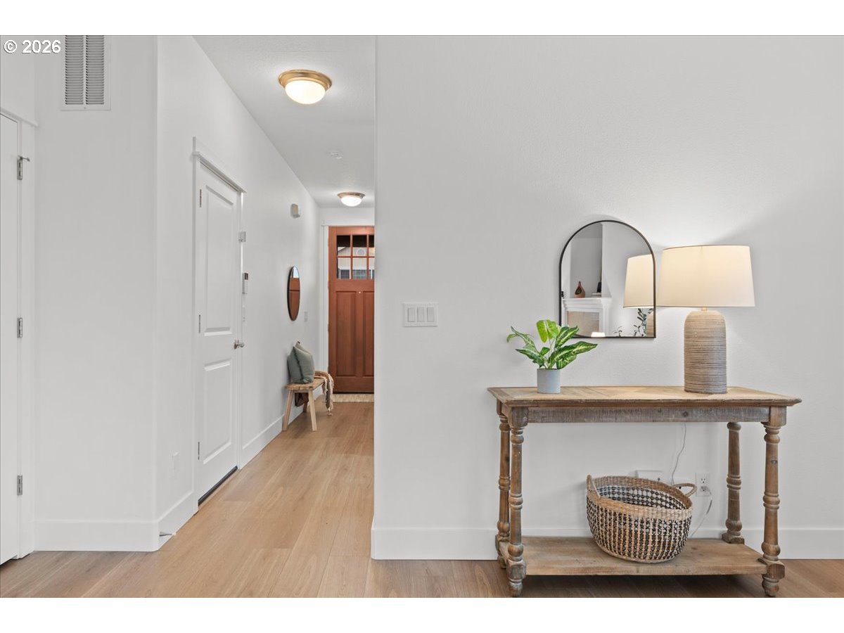 11595 Southwest Butte Lane Beaverton, OR 97008 - Photo 9 of 48 a living room with furniture and a potted plant