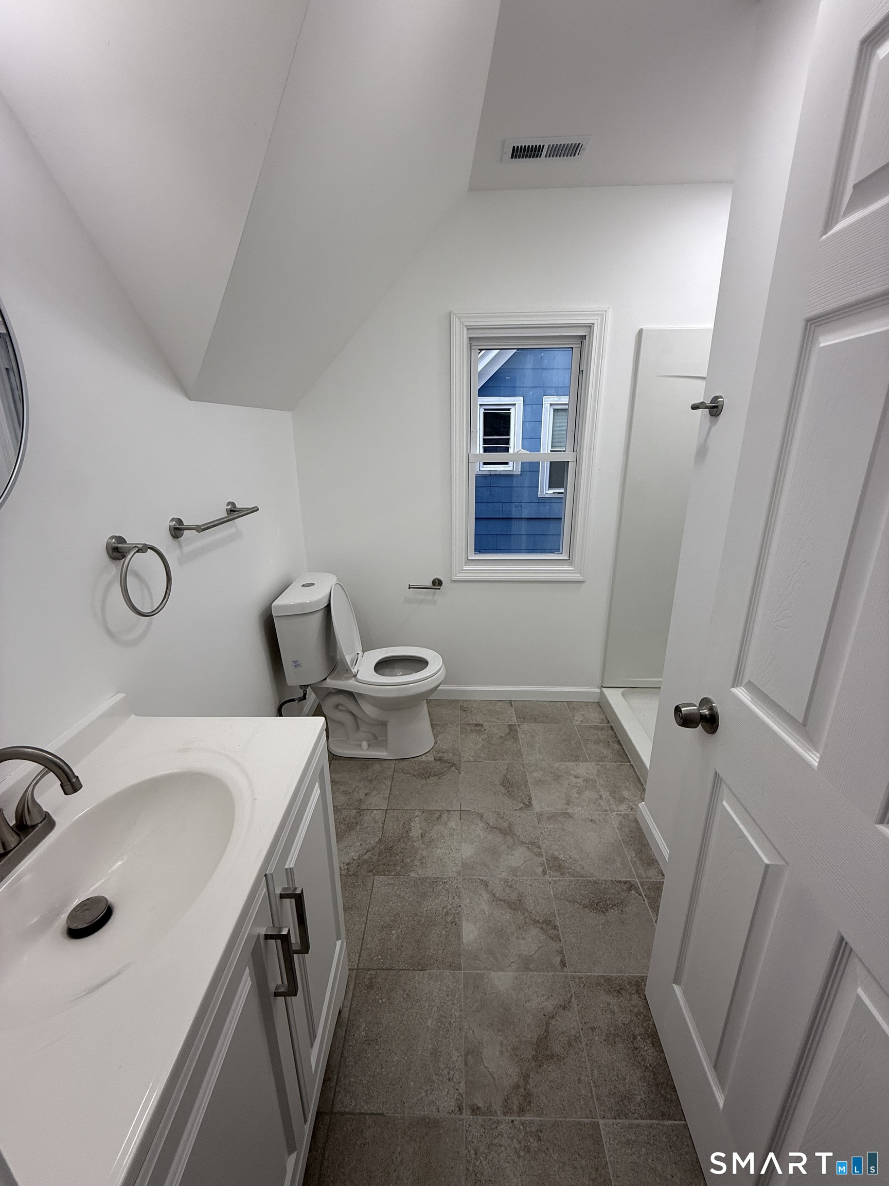 10 Cross Street Hamden, CT 06514 - Photo 3 of 7 a bathroom with sink and mirror
