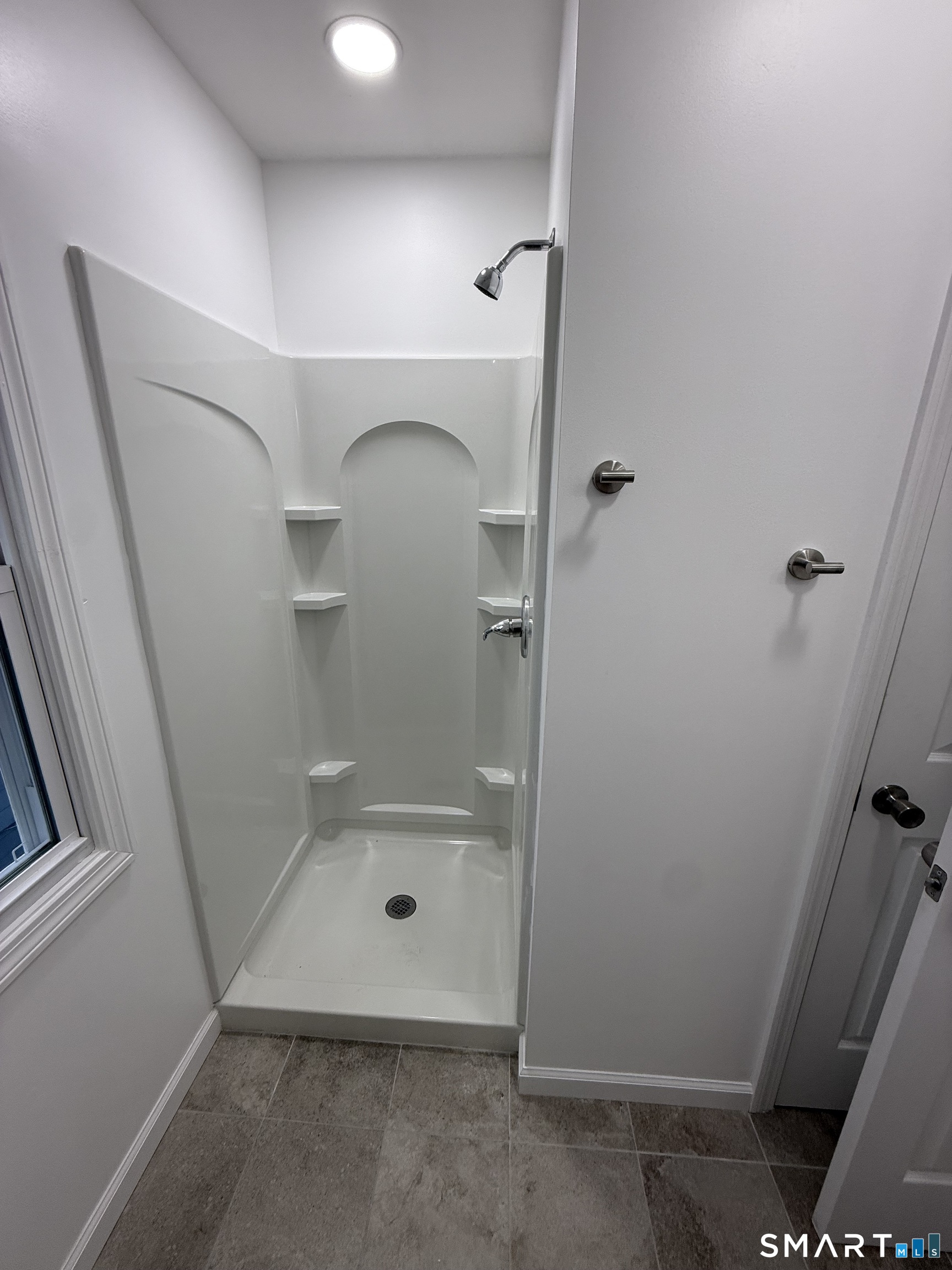 10 Cross Street Hamden, CT 06514 - Photo 4 of 7 a bathroom with a shower
