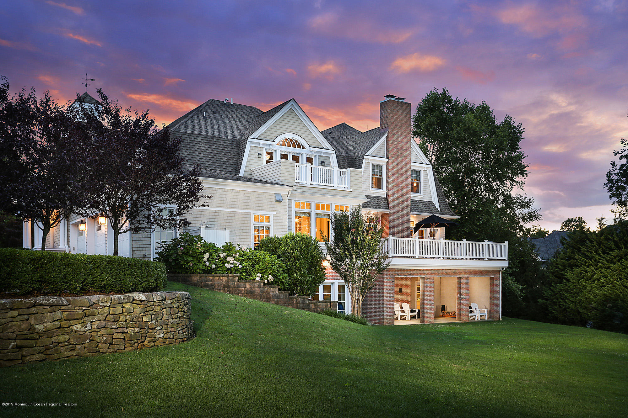3 Sugar Maple Lane Rumson, NJ 07760 - Photo 2 of 33 a front view of a house with a garden