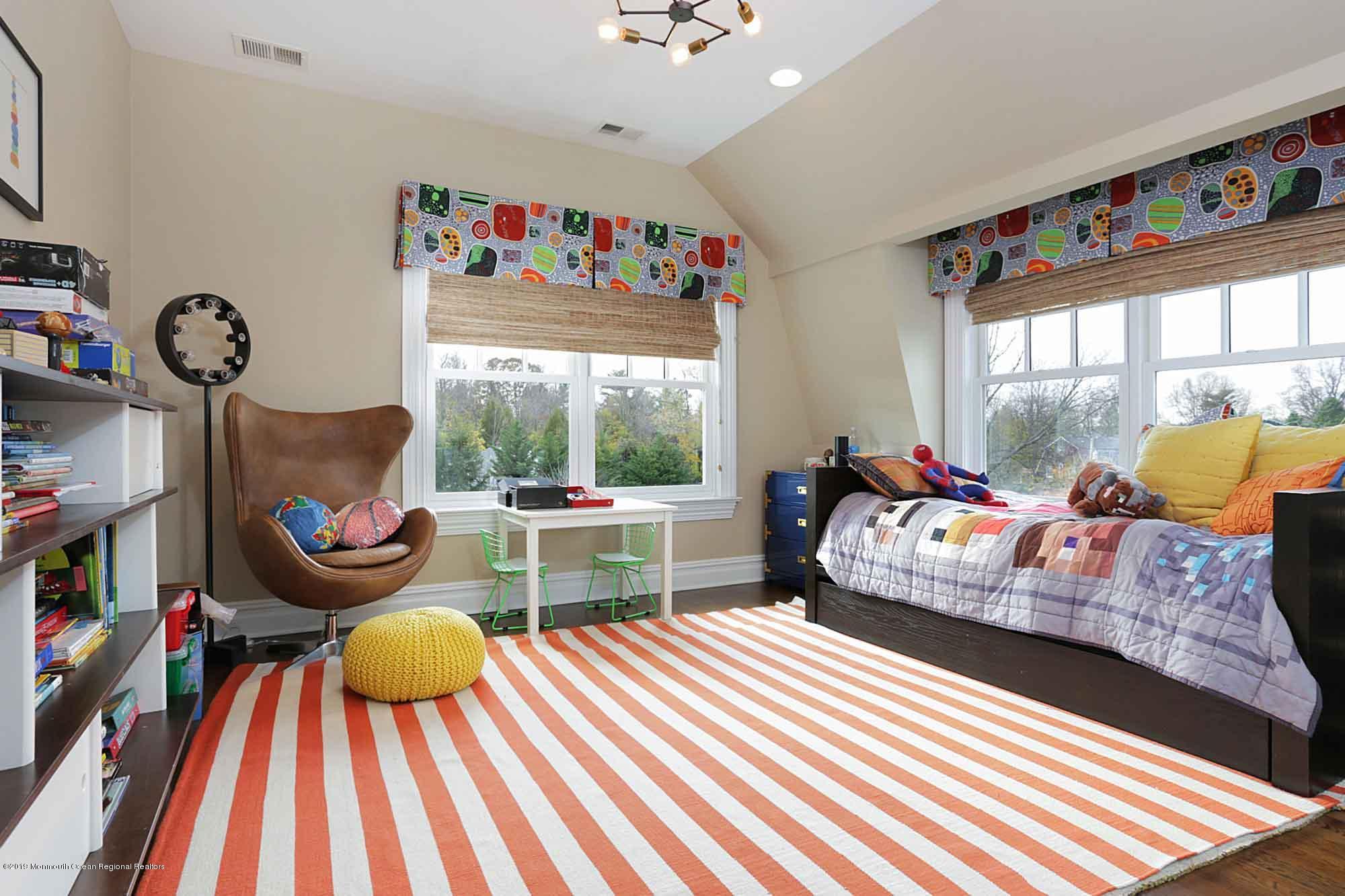 3 Sugar Maple Lane Rumson, NJ 07760 - Photo 18 of 33 a bedroom with furniture and a large window