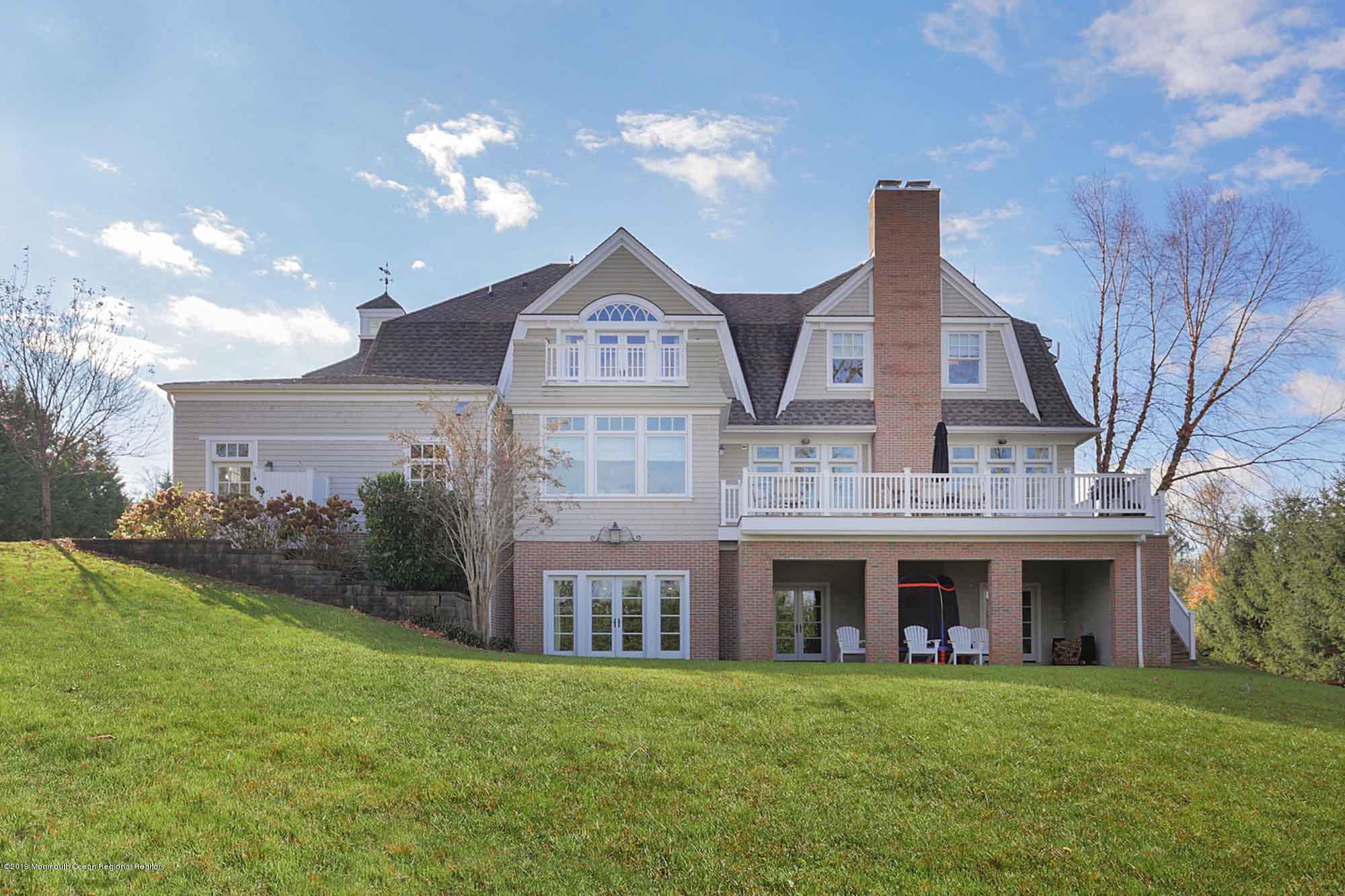 3 Sugar Maple Lane Rumson, NJ 07760 - Photo 25 of 33 a front view of a house with garden