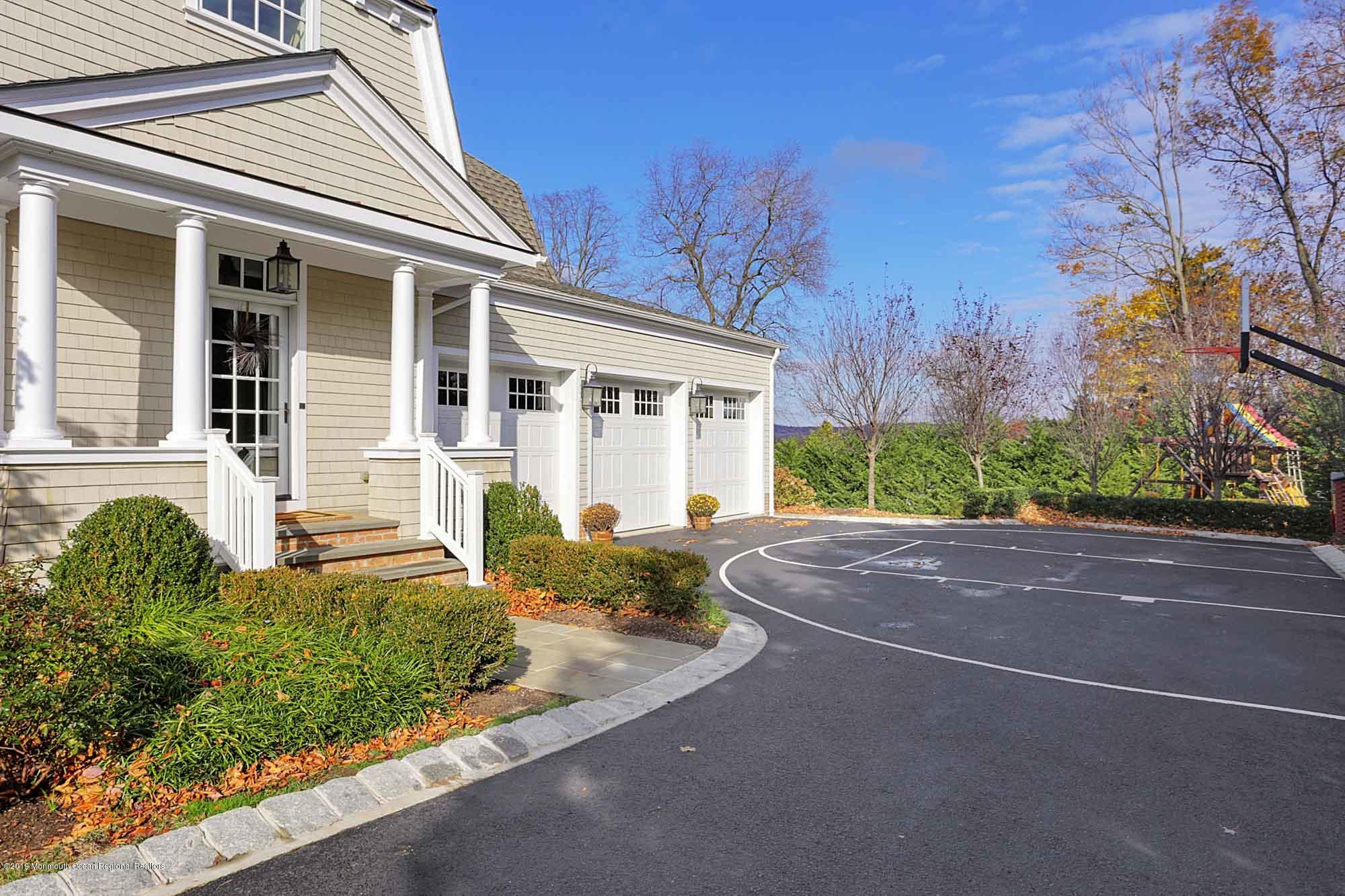 3 Sugar Maple Lane Rumson, NJ 07760 - Photo 26 of 33 front view of a house with a yard
