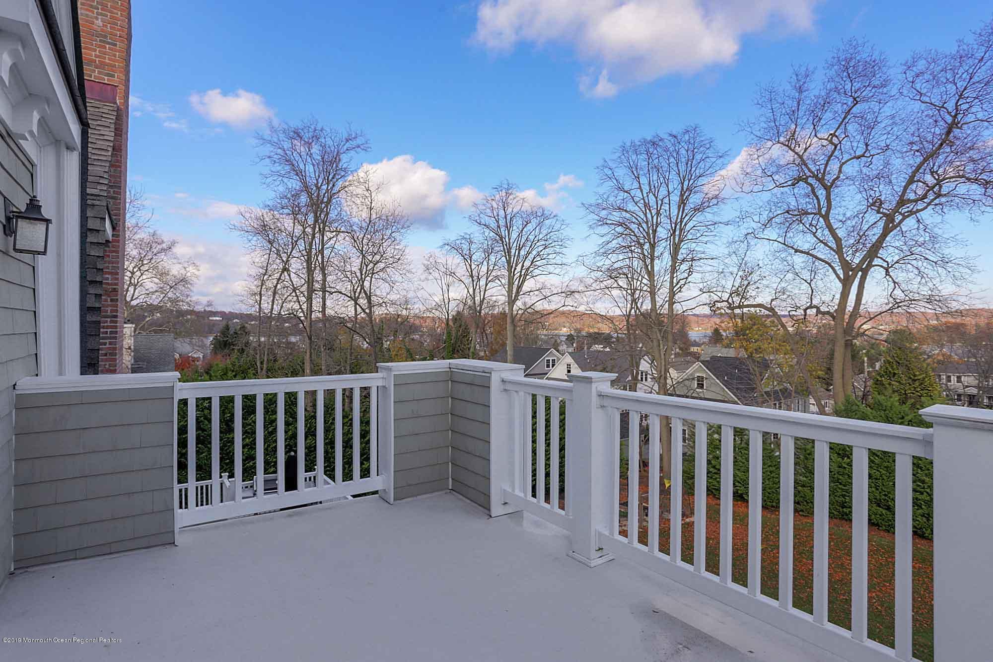 3 Sugar Maple Lane Rumson, NJ 07760 - Photo 28 of 33 a view of a balcony with wooden fence