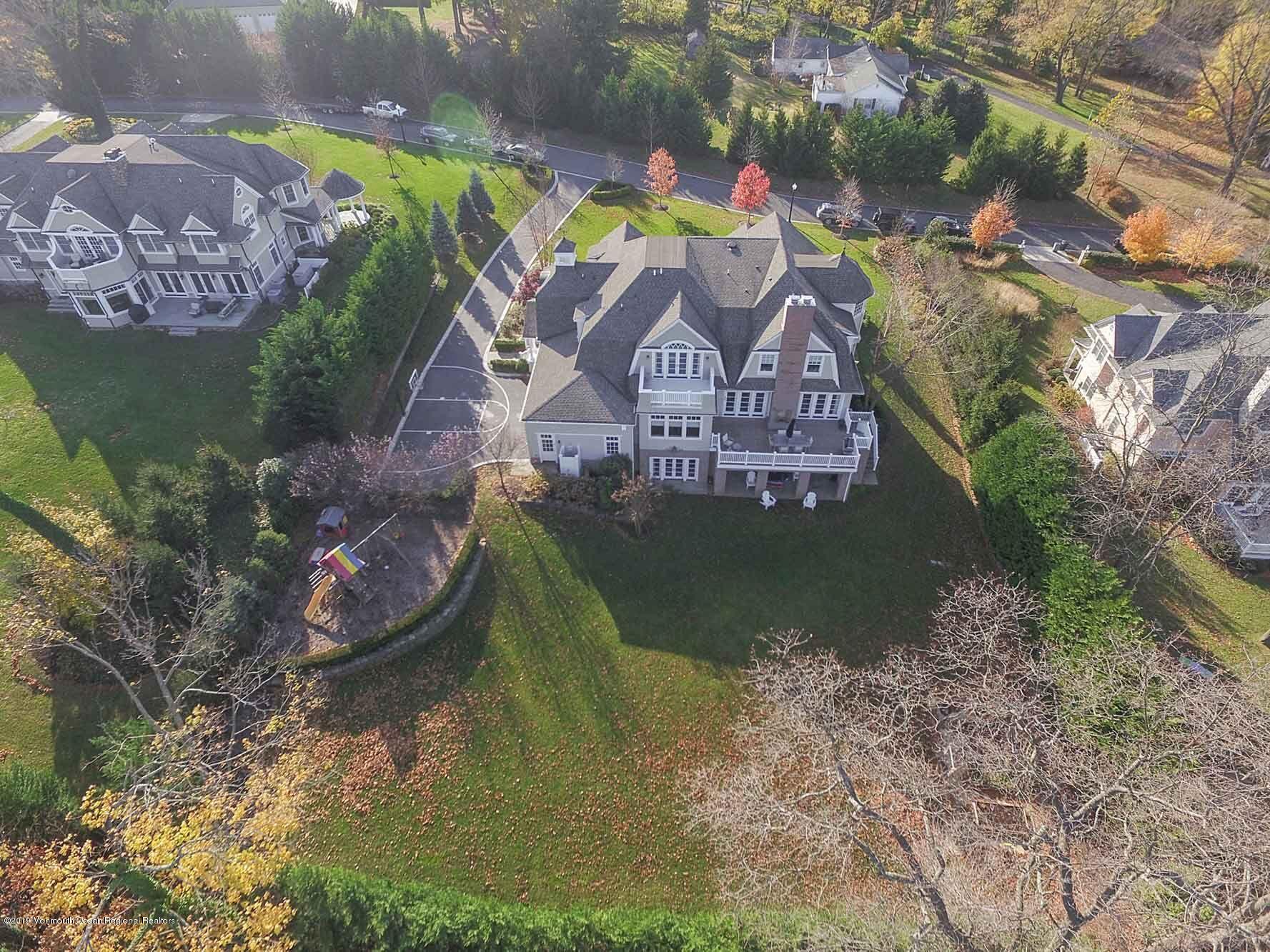 3 Sugar Maple Lane Rumson, NJ 07760 - Photo 32 of 33 a view of a swimming pool with a yard