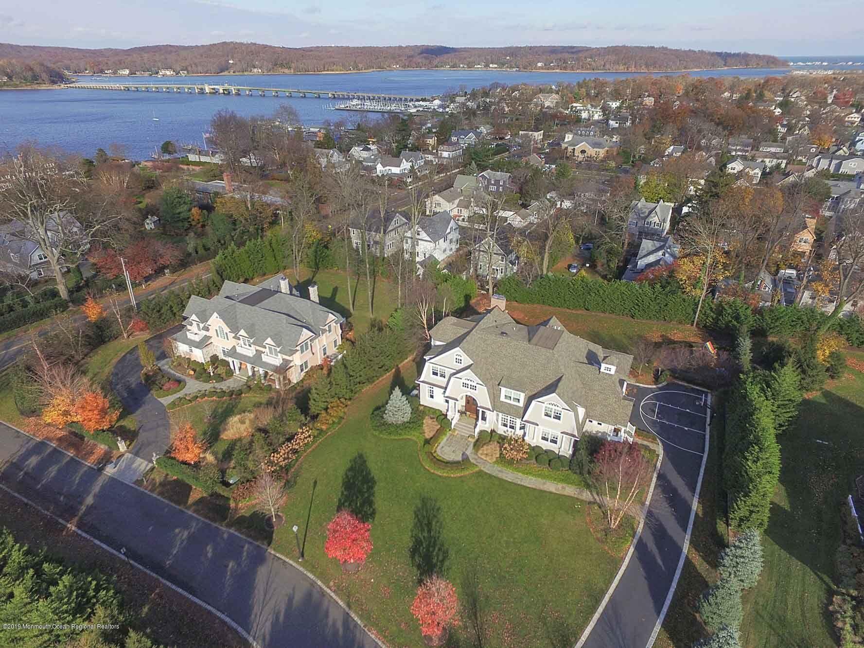 3 Sugar Maple Lane Rumson, NJ 07760 - Photo 5 of 33 an aerial view of a house with a lake view