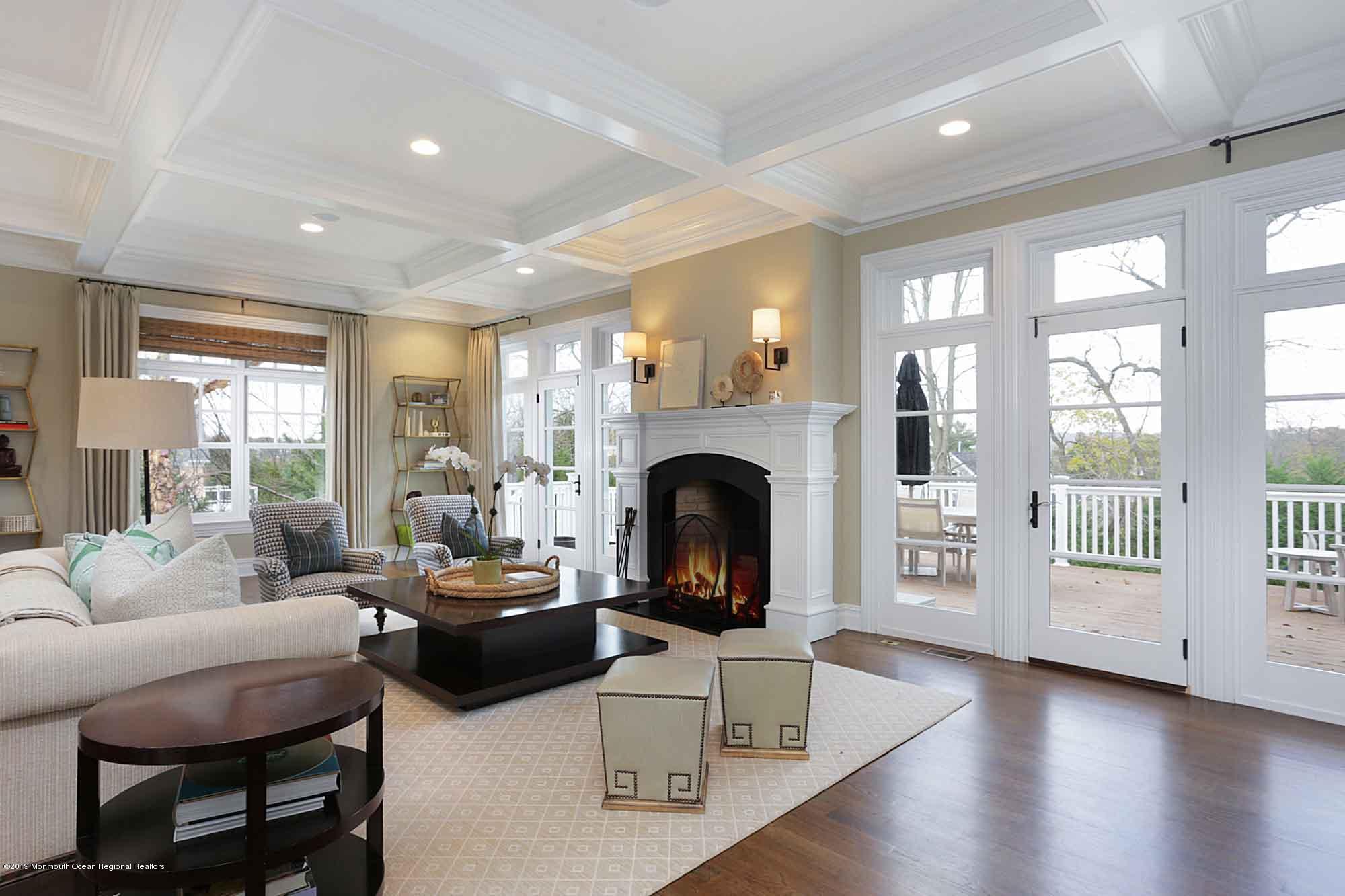 3 Sugar Maple Lane Rumson, NJ 07760 - Photo 9 of 33 a living room with furniture and a fireplace