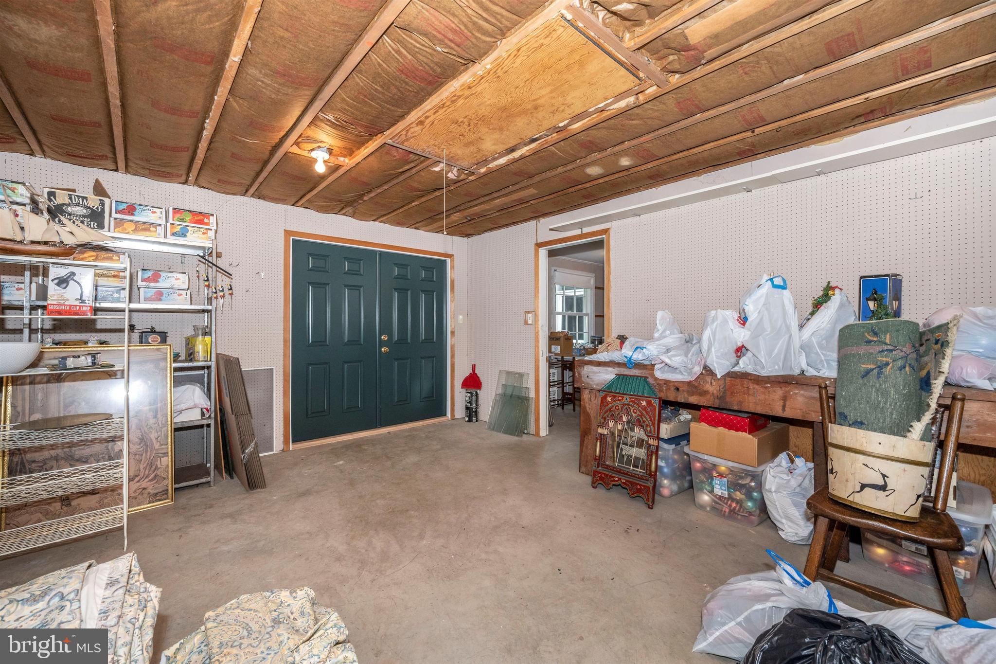 7411 Round Hill Road Frederick, MD 21702 - Photo 44 of 71 Second storage area with doors leading to the back