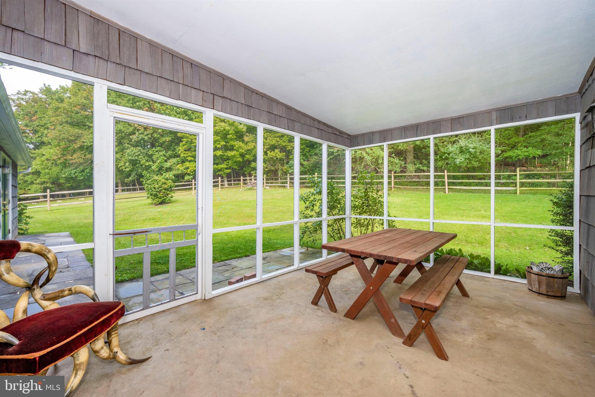 7411 Round Hill Road Frederick, MD 21702 - Photo 47 of 71 Screened in porch